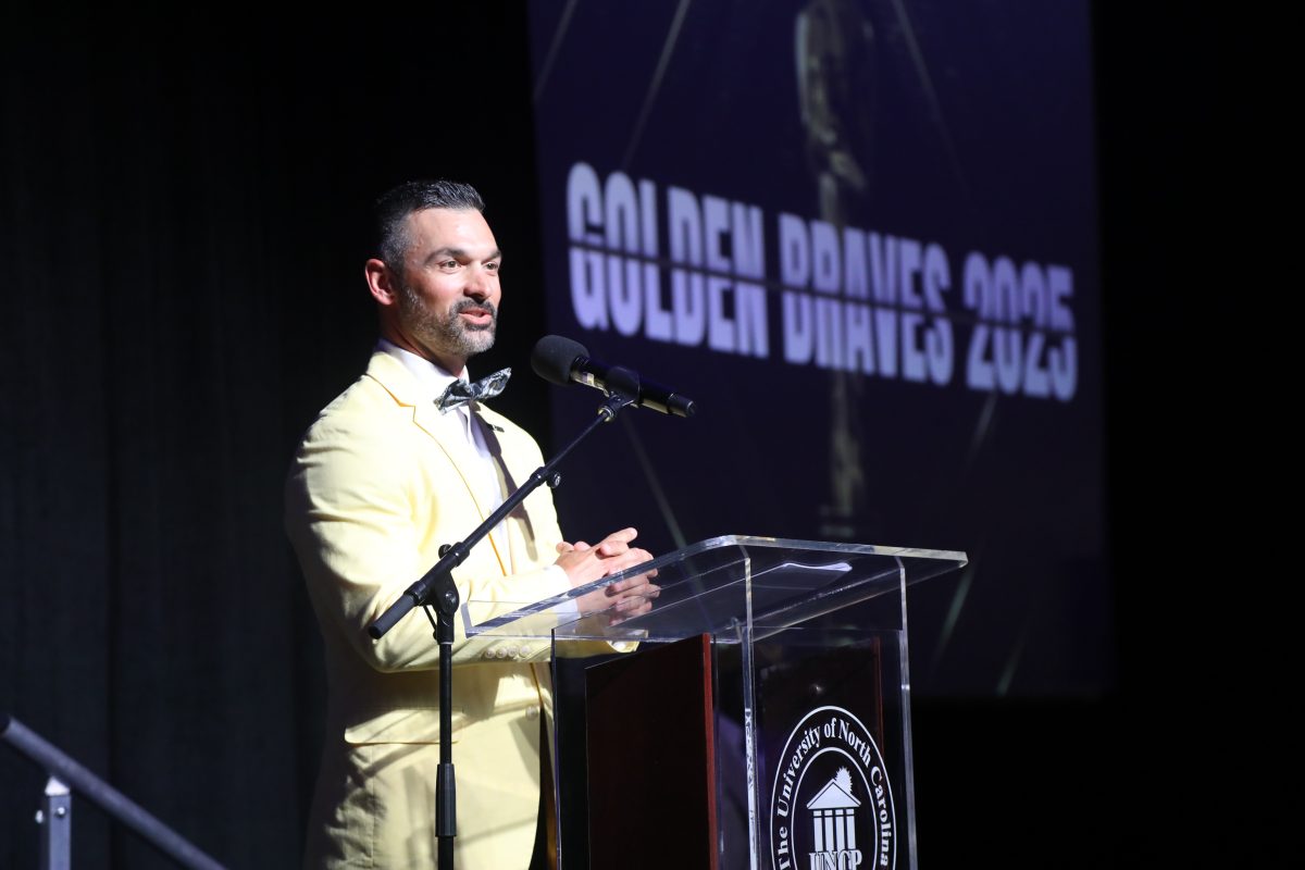 Dick Christy addresses the Golden Braves event in honor of student athletes. April 29, 2025. Photo/ Willis Glasgow